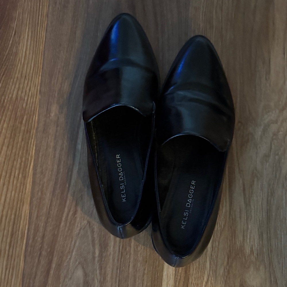 Kelsi Dagger Sleek Black Slip-Ons